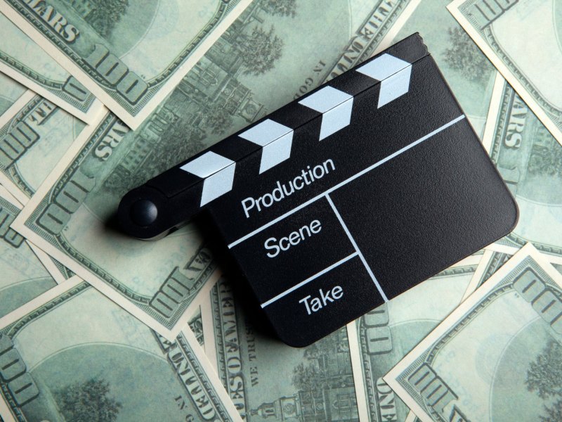 Filmklappe mit Geld