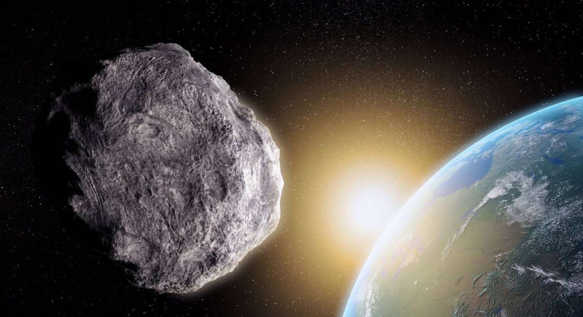 Asteroid schwebt über der Erde.